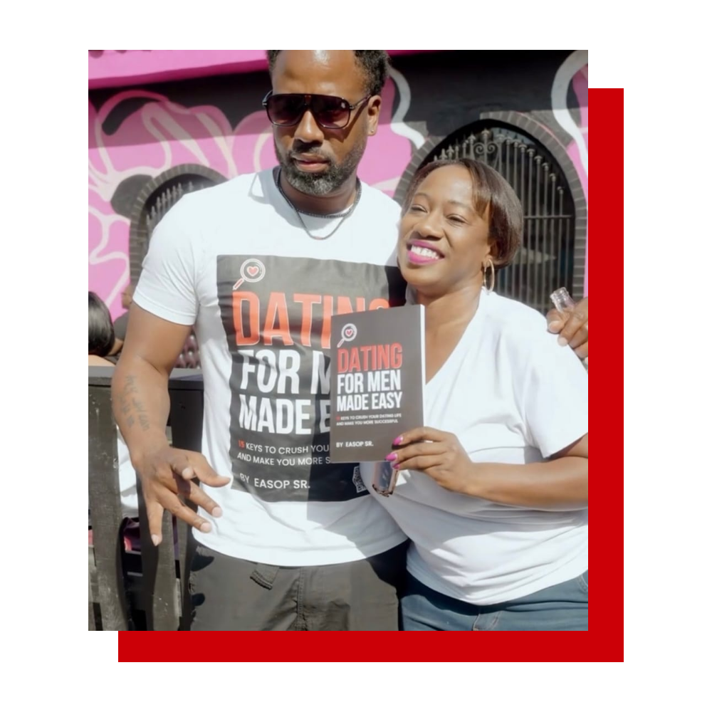 Easop Winston Sr. with a reader holding Dating for Men Made Easy